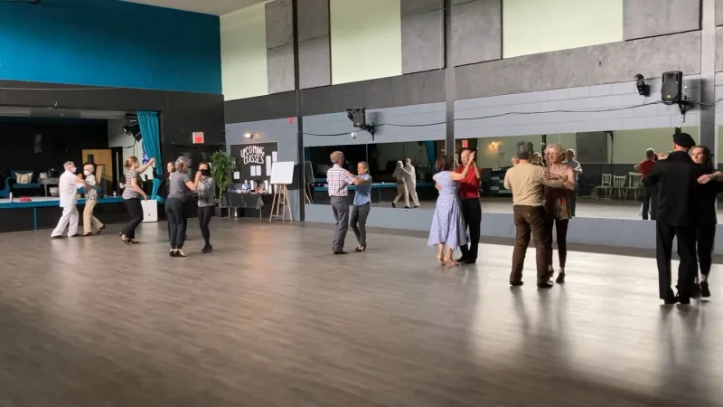 Couples practicing partner turns in an intermediate la salsa dance class in Ottawa at DQ Ballroom & Fitness