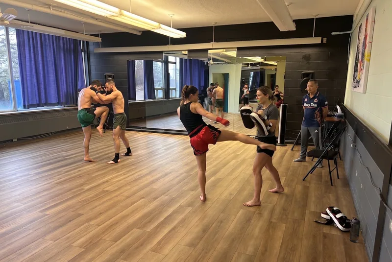 Muay Thai kickboxing drills in the small studio available for martial arts rentals in Ottawa at DQ Ballroom & Fitness